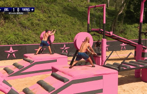 Two from the blue team fight to stay in the game